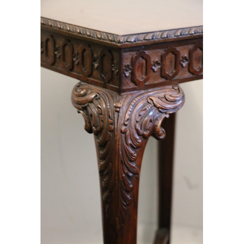 498 - Early 20th century mahogany table in the manner of Gillows, the square top with feather moulded edge... 