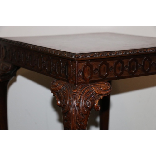 498 - Early 20th century mahogany table in the manner of Gillows, the square top with feather moulded edge... 