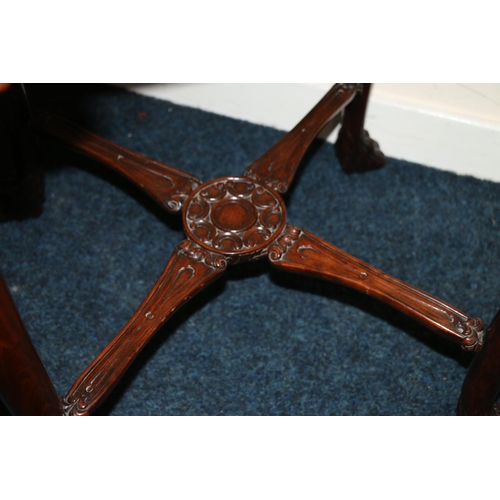 498 - Early 20th century mahogany table in the manner of Gillows, the square top with feather moulded edge... 