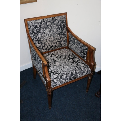 499 - Antique French Empire style armchair upholstered in black floral patterned fabric, raised on fluted ... 