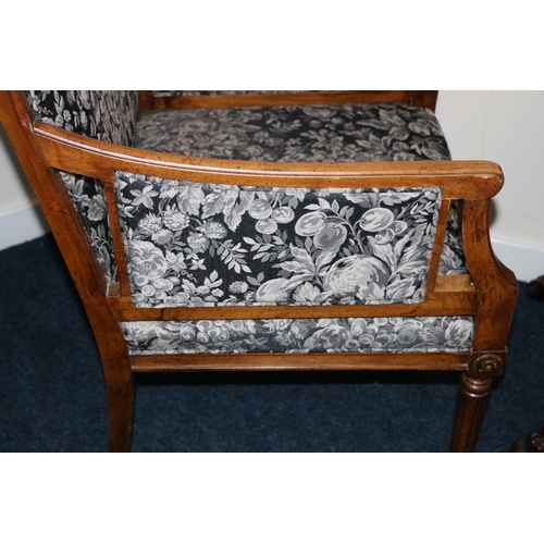 499 - Antique French Empire style armchair upholstered in black floral patterned fabric, raised on fluted ... 