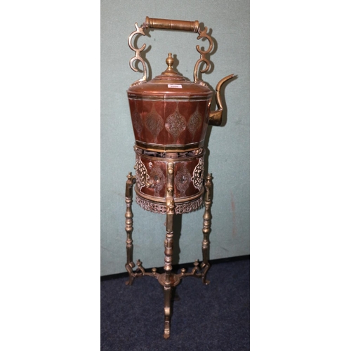 500 - Gypsy style copper and brass kettle with incised floral decoration, raised on turned brass stand, 98... 