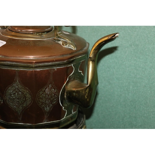 500 - Gypsy style copper and brass kettle with incised floral decoration, raised on turned brass stand, 98... 