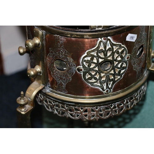 500 - Gypsy style copper and brass kettle with incised floral decoration, raised on turned brass stand, 98... 