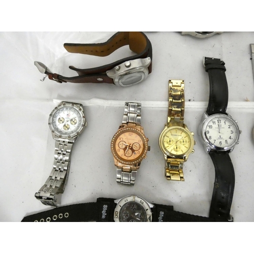 100 - Various fashion watches to include Michel Kors, Fossil, Ben Sherman etc.