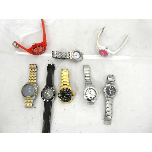 101 - Large bag of various sports watches to include Accurist, Sekonda, Solar etc.