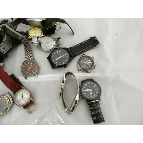 75 - Large bag of men's Quartz watches to include Casio, Toro, Orlando, Timberland etc.