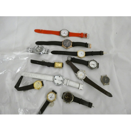 76 - Large bag of unisex Quartz watches to include Accurist, Sekonda, Swatch etc.