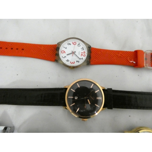 76 - Large bag of unisex Quartz watches to include Accurist, Sekonda, Swatch etc.