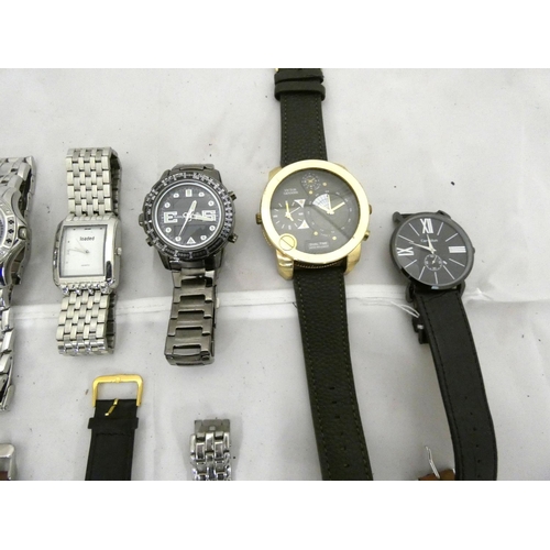 88 - Bag of modern man's fashion watches to include Spirit, NY London etc.