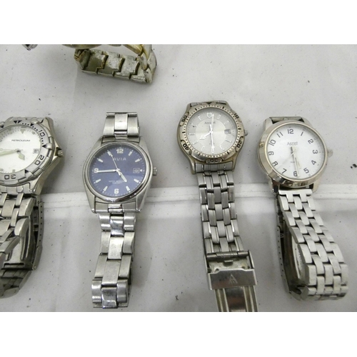 95 - Large bag of men's sports watches to include Ben Sherman, Adidas, Aviva, Ascot etc.