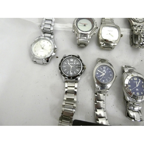 95 - Large bag of men's sports watches to include Ben Sherman, Adidas, Aviva, Ascot etc.