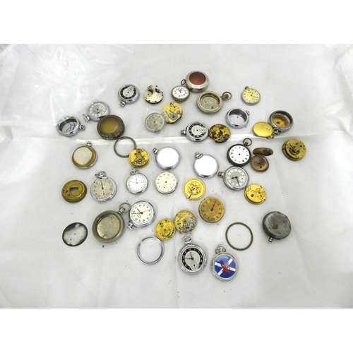 96 - Large bag of pocket watch spares to include cases.