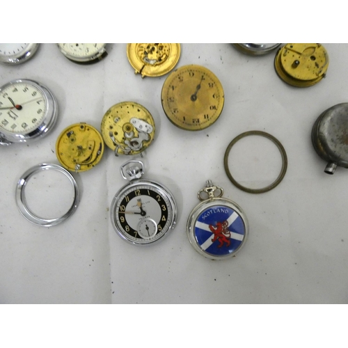 96 - Large bag of pocket watch spares to include cases.