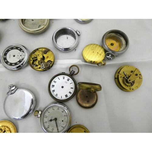 96 - Large bag of pocket watch spares to include cases.