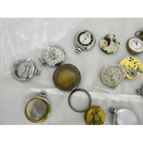 96 - Large bag of pocket watch spares to include cases.