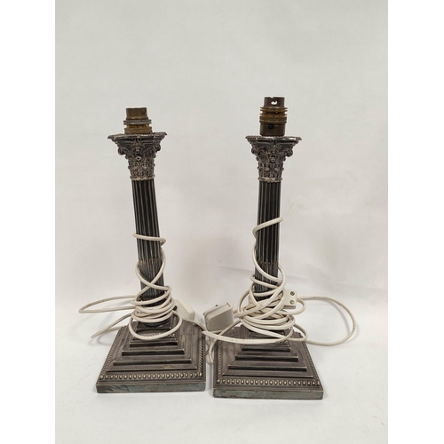 101 - Pair of e.p. table lamps with Corinthian columns on stepped beaded bases, 33.5cm including fittings,... 