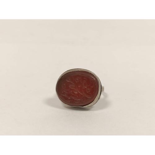 102 - Antique Middle Eastern ring with inscribed carnelian in silver, probably 18th/19th century.