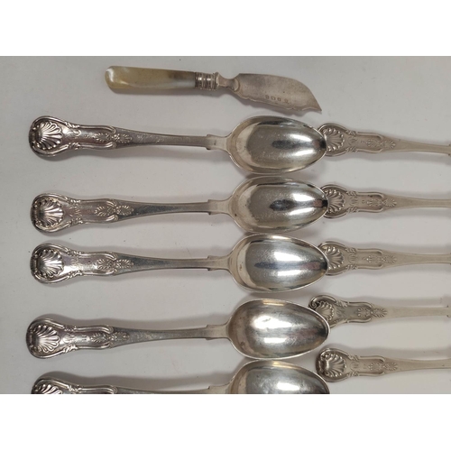 125 - Nineteen Scottish silver tea spoons and two butter knives.