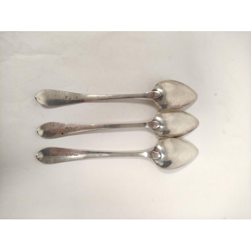 125 - Nineteen Scottish silver tea spoons and two butter knives.