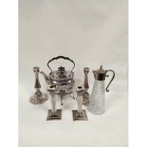 128 - Two pairs of e.p. table candlesticks and similarly mounted claret jug, & a tea kettle.