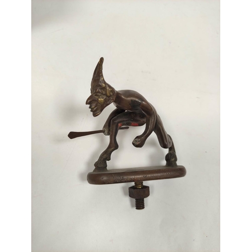 137 - Bronze radiator mascot modelled as an imp, C1920's and a similar figure.