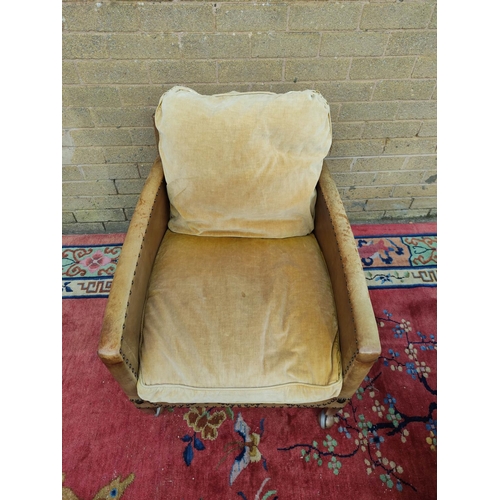 415 - Pair of Regency style hide upholstered low arm chairs, circa early 20th century, with studded decora... 