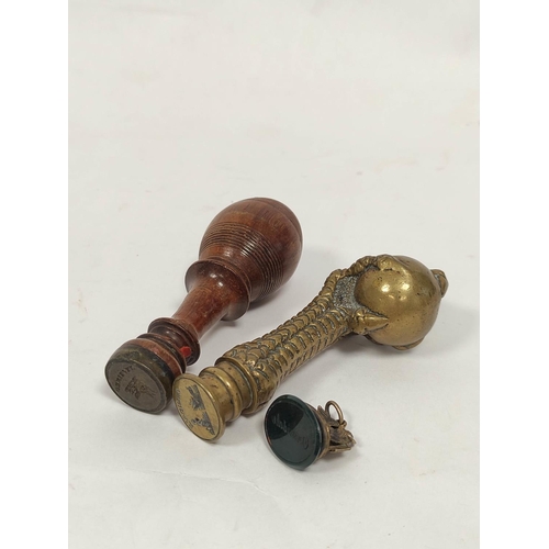 122 - Silver gilt and bloodstone fob seal with griffin grip 'Ormidale', c1820 and a desk seal with wood gr... 