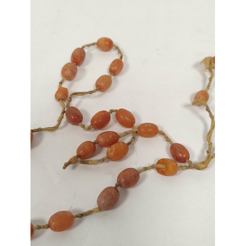 124 - Amber bead necklet. 15g gross.