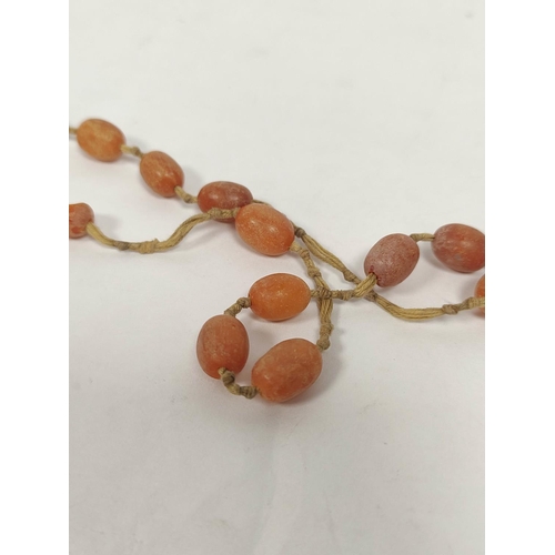 124 - Amber bead necklet. 15g gross.