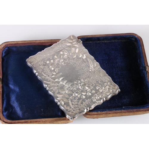 77 - Edward VII Art Nouveau period antique silver card case with all over scrolling foliage decoration, b... 