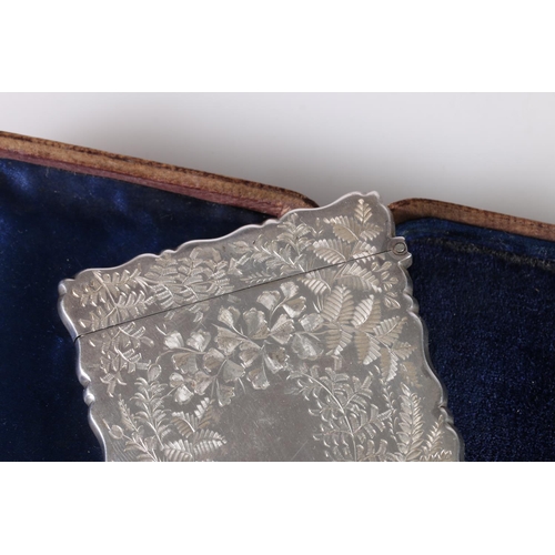 77 - Edward VII Art Nouveau period antique silver card case with all over scrolling foliage decoration, b... 