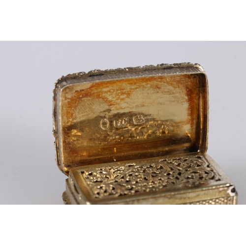 81 - William IV antique silver gilt vinaigrette with all over engine turned decoration with relief scroll... 