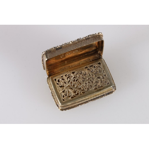 81 - William IV antique silver gilt vinaigrette with all over engine turned decoration with relief scroll... 