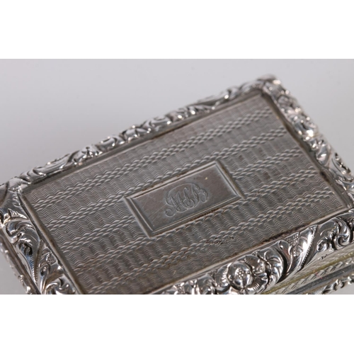 83 - Georgian parcel gilt silver vinaigrette of rectangular form, the body with engine turned decoration ... 