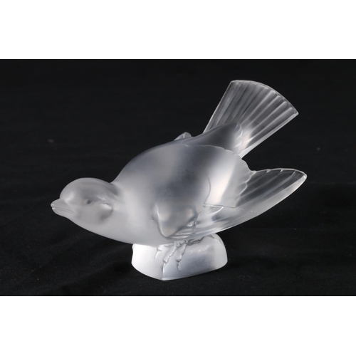 402 - Lalique of France, a frosted glass mascot in the form of a bird, etched 'Lalique France' to the base... 