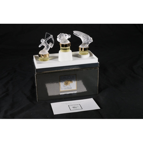 404 - Lalique of France, three frosted glass perfume bottles from the 'Flacons Collection Mascottes' colle... 