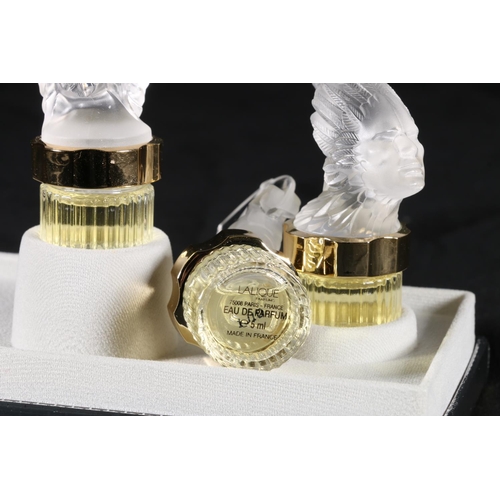 404 - Lalique of France, three frosted glass perfume bottles from the 'Flacons Collection Mascottes' colle... 