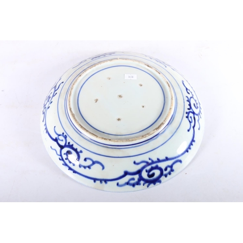 486 - Oriental blue and white porcelain charger dish, the interior with three blossoming trees, the floral... 