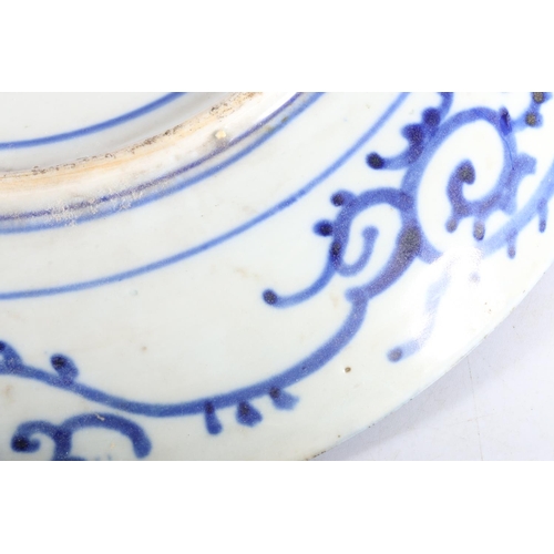 486 - Oriental blue and white porcelain charger dish, the interior with three blossoming trees, the floral... 