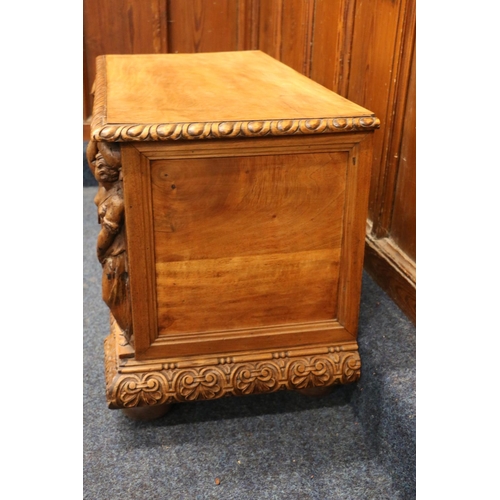 507 - Antique Italian walnut cassone type hinged top blanket box, the front with fielded panel flanked by ... 