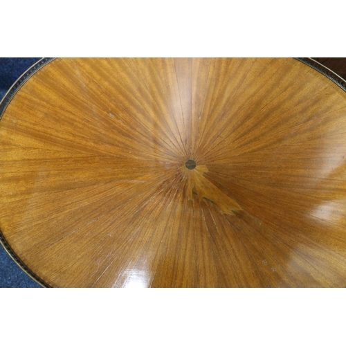 515 - French Empire style oval coffee table with pierced metal gallery, raised on circular tapering fluted... 