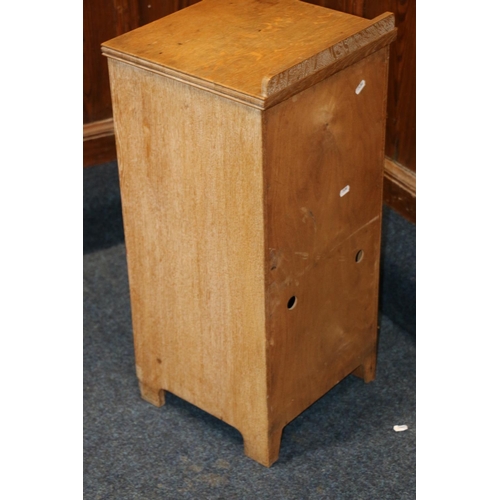 516 - Heals of London, a limed oak ledge back bedside cabinet, Heals button to the inside of the drawer, 7... 