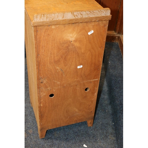 516 - Heals of London, a limed oak ledge back bedside cabinet, Heals button to the inside of the drawer, 7... 