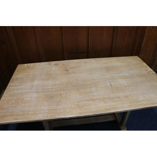 520 - Manner of Heals of London, an Arts & Crafts style limed oak refectory style dining table raised ... 