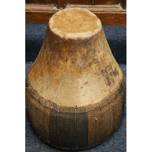 528 - African skin and hide covered drum, 49cm tall, 42cm diameter.