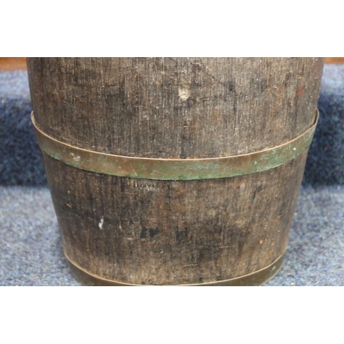 502 - Antique coopered oak oval section cask stick stand with copper rungs, 59cm tall.