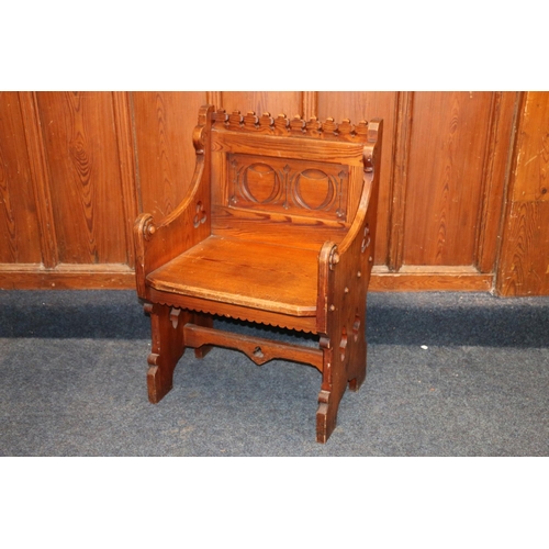 505 - Carved pitched pine church altar chair with ecclesiastical pierced quatrefoil and trefoil design, ca... 