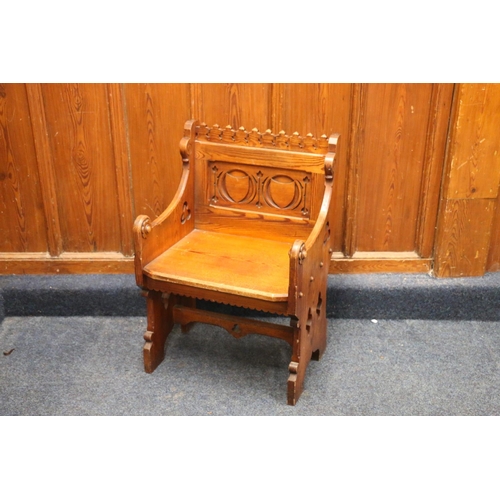 505 - Carved pitched pine church altar chair with ecclesiastical pierced quatrefoil and trefoil design, ca... 