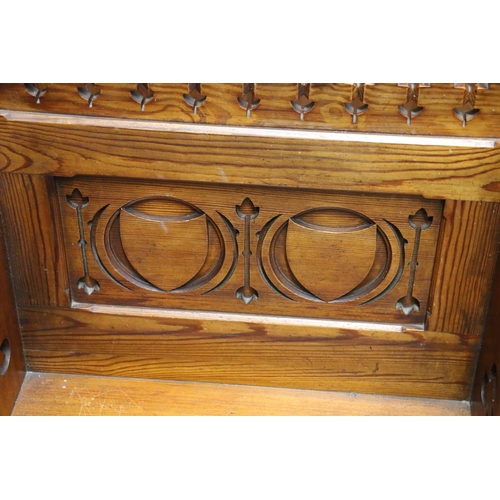 505 - Carved pitched pine church altar chair with ecclesiastical pierced quatrefoil and trefoil design, ca... 